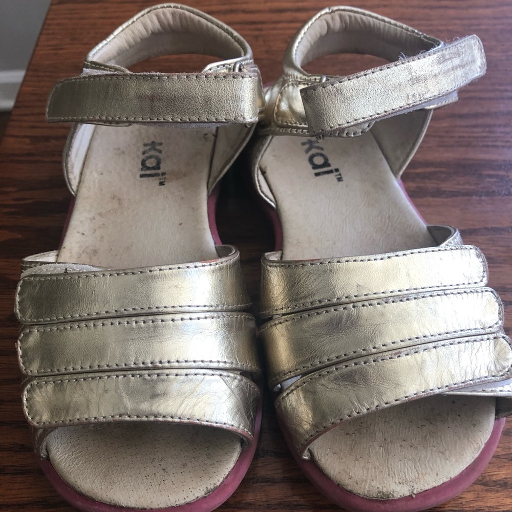 See Kai Run gold gladiator style sandals size 10